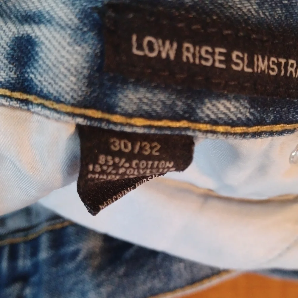Black brand super distressed, acid wash looking jeans.Size 30x32.